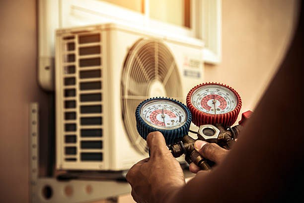 Professional Hvac Maintenance technician working in Millis, MA